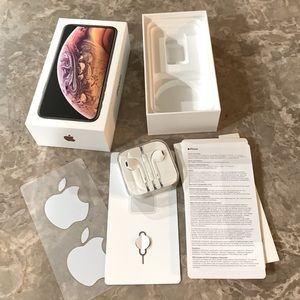Empty Apple iPhone XS box and EarPods